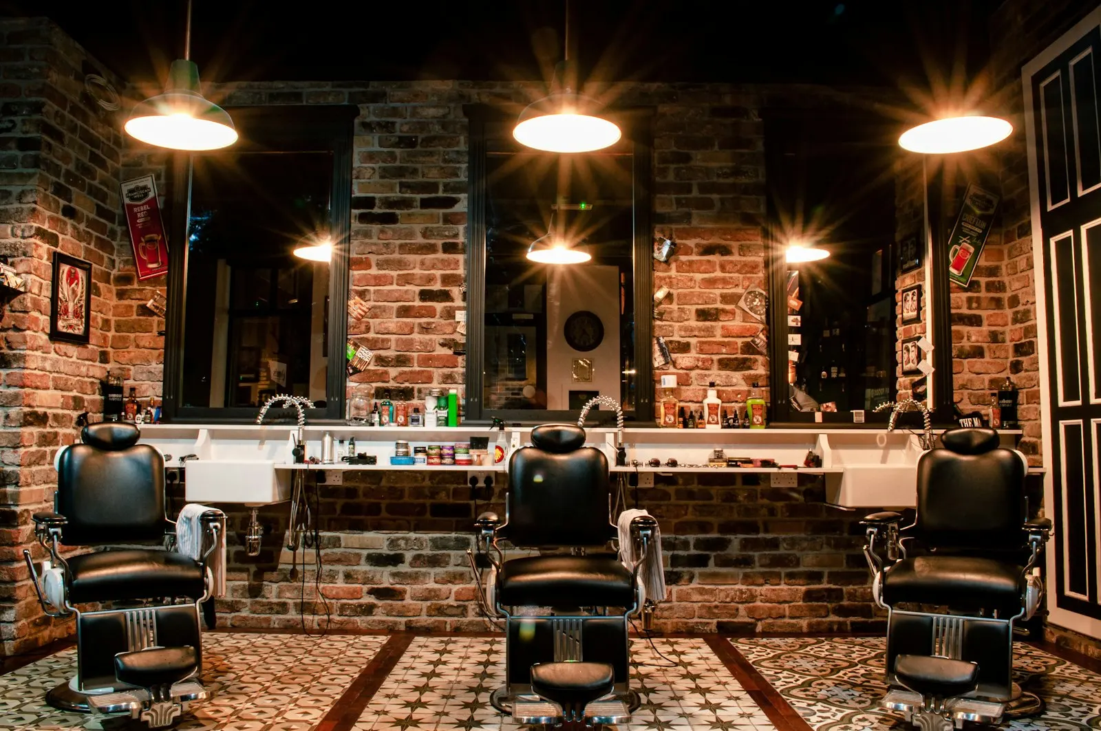 A leather barber chair in front of a brick wall